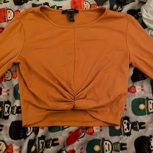 A crop top. Very  comfortable, would look amazing with jeans or leggings